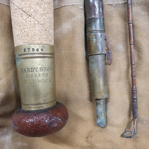 697 - A 19th Century Hardy Brothers three piece cane Rod, with original sleeve.