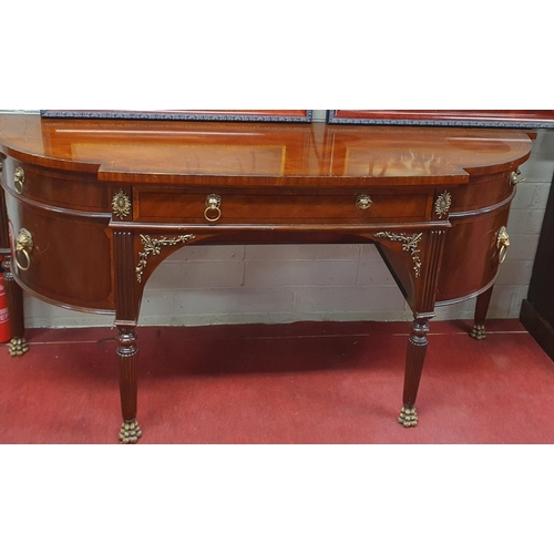 724 - A good Regency style Sideboard with lions head handles on reeded supports. 183 x 53 x H 87 cm approx... 