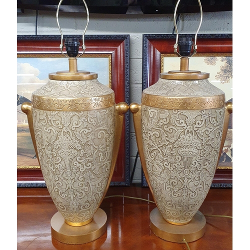 725 - A very good pair of large bulbous Table Lamps. H 62 cm approx.