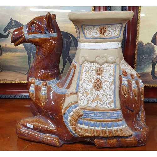 726 - A good brown and beige ground Porcelain Camel Seat. L 47 x H 44 cm approx.