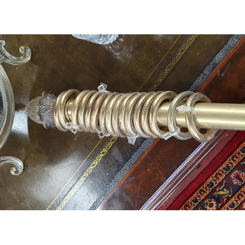 734 - A good Brass curtain Pole with rings, 200cm approx.