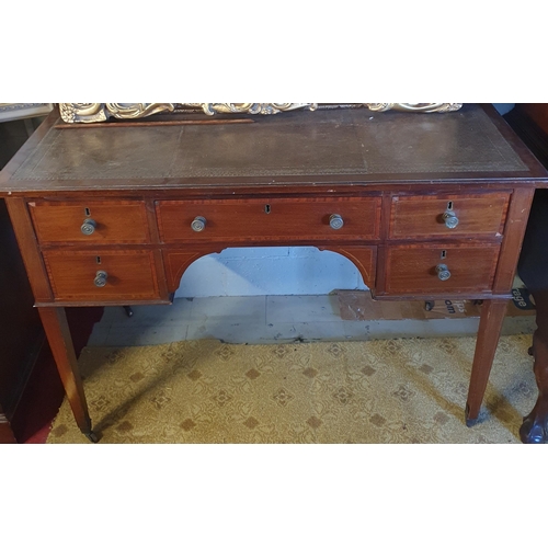 739 - A late 19th Century Mahogany and Veneered kneehole Desk with leather insert with brass handles on sq... 