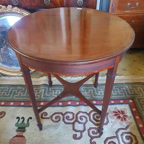 753 - An Edwardian Mahogany and Inlaid Centre Table.
D 69 x H 71 cm approx.