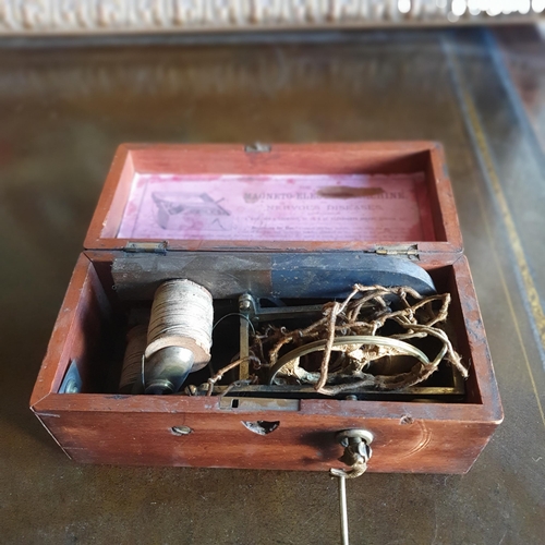 785 - A vintage Electric shock Machine in a Mahogany and inlaid Box.