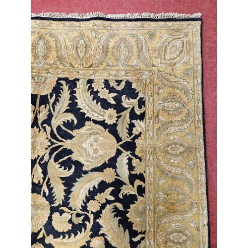 436 - A cream ground Carpet with multi borders. 292 x 188 cm approx.