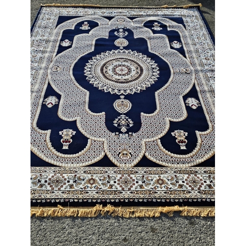 848 - A large Blue and Cream ground full pile fine woven Turkish Carpet with all over design. 400 x 300cm ... 