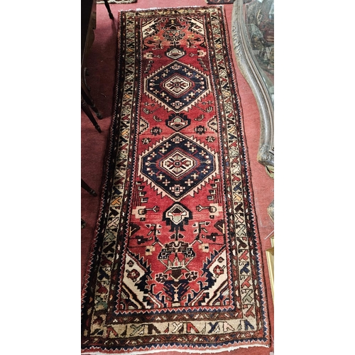 963 - A Red ground hand washed full pile Persian Ardabil Runner. 274 x 103 cm approx.