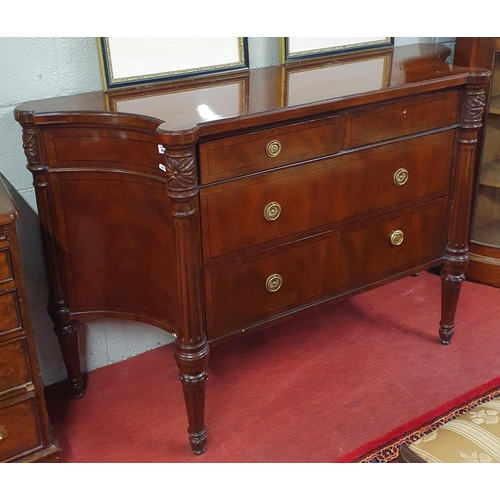 800 - A Mahogany and veneered two door Side Cabinet with twin frieze drawer and concave ends on turned flu... 