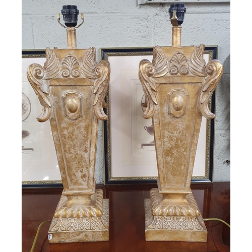 803 - A large pair of Table Lamps with gilded outline. (slight damage to one). H 67 cm approx.