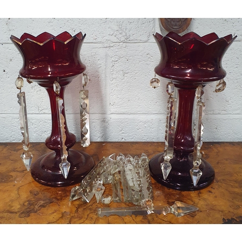 809 - A good pair of 19th Century Cranberry Glass Lustres with crystal drops. H 34 cm approx.