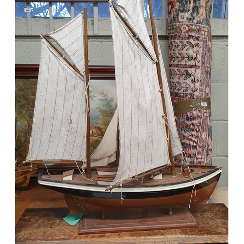 838 - A group of three scratch built Sailing Ships along with a timber toy ship.