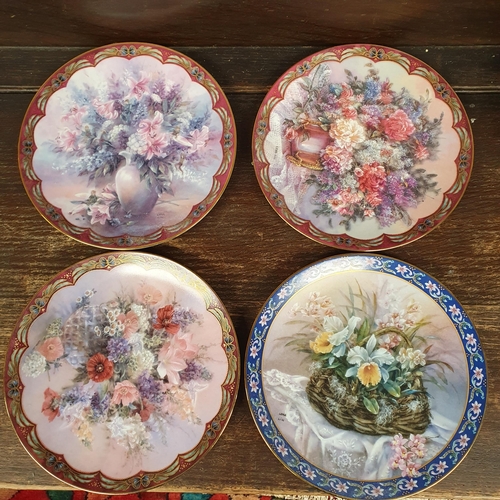 867 - A large group of Collectors Plates. A set of eight and a set of four depicting flowers. D 21 cm appr... 