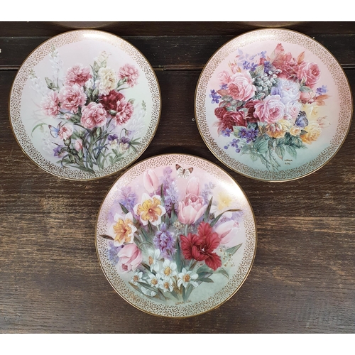 867 - A large group of Collectors Plates. A set of eight and a set of four depicting flowers. D 21 cm appr... 