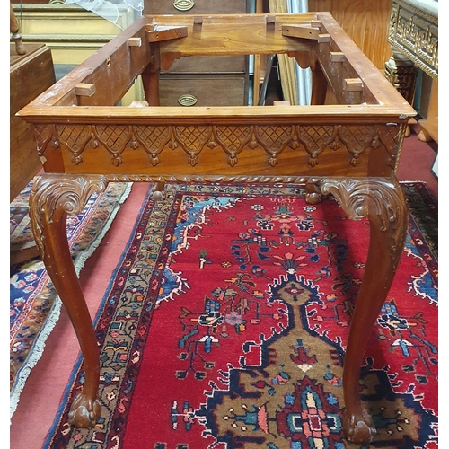 902 - A modern Mahogany table Frame with carved cabriole supports along with a Mahogany coffee Table and S... 