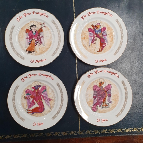 910 - A group of Porcelain Pockets along with two decorative Plates and a set of four with religious theme... 