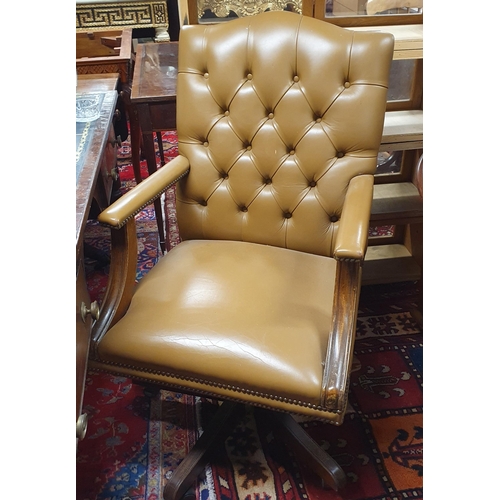 913 - A really good beige colour swivel Office Chair with deep button back. W 61 x SH 52 x BH 107 cm appro... 