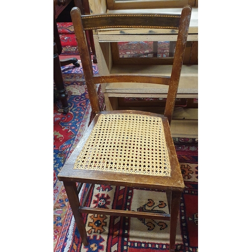 917 - A group of three early 20th Century bedroom Chairs, two with cane seats.