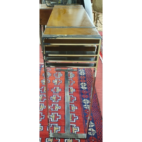 943 - An Art Deco style Chrome and Walnut console Table. 100 x 29 x H 80 cm approx.