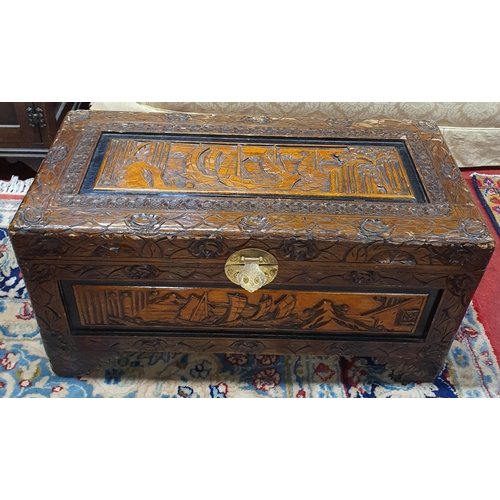 947 - Two Oriental Camphorwood Chests with highly carved outline. 69 x 34 x H 35, 42 x 88 x H 47 cm approx... 