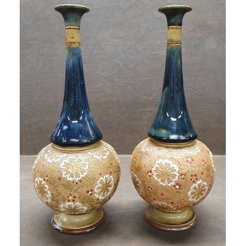 1002 - A pair of 19th Century Royal Doulton salt glaze Vases. H 29 cm approx.