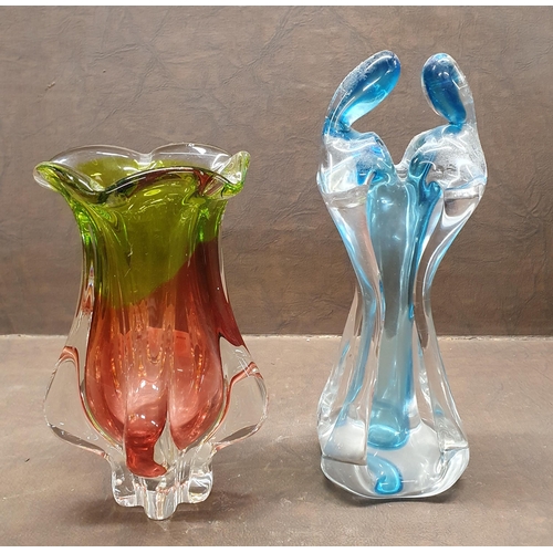 1032 - An Art Glass green and cranberry Vase along with a figural group of lovers possibly Murano. H 21, H ... 