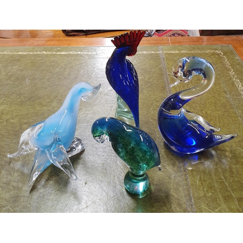 1036 - A group of four Art Glass Italian figures of birds some possibly Murano. H 22 cm approx.