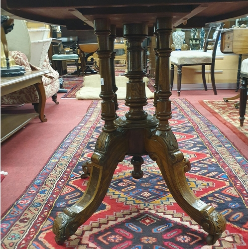 1083 - A 19th Century Walnut oval Supper Table with Inlaid top on quatrefoil base.
H 70 x W 114 x D 82 cm a... 