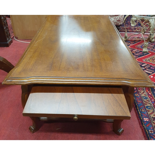 1103 - A reproduction Hardwood Coffee Table on splayed supports and stretcher base.
H 42 x W 120 x D 66 cm ... 