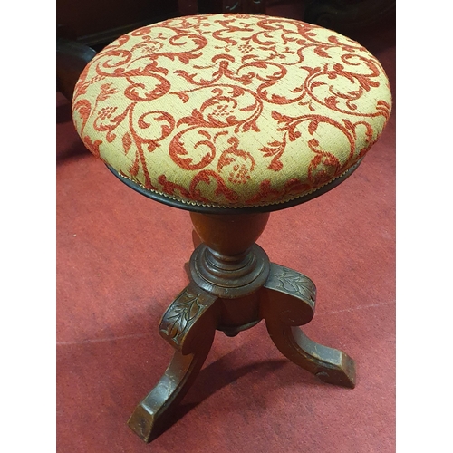 1174 - A 19th Century Mahogany revolving Piano Stool on tripod base. D 31 x H 49 cm approx.