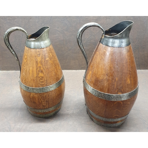 1212 - Two 19th Century wooden Wine/Cider Pitcher with Brass banding, one holding approx 2L and the other 1... 