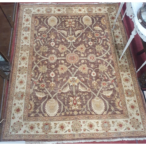 1149 - A brown and beige ground Rug with multi borders and unique medallion central design. 216 x 174cm app... 