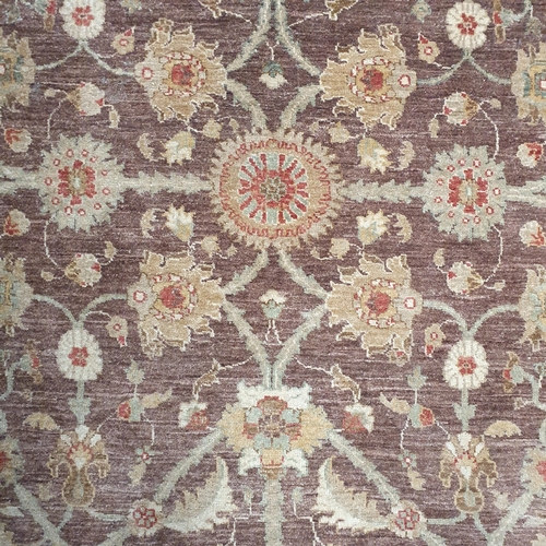 1149 - A brown and beige ground Rug with multi borders and unique medallion central design. 216 x 174cm app... 