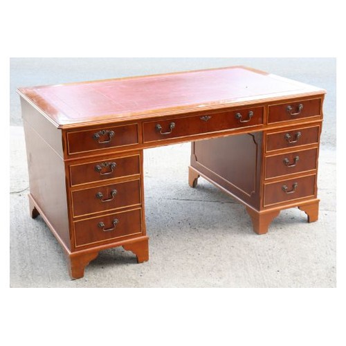 617 - A reproduction Yew wood Desk. 120 x 60 x H 79 cm approx.