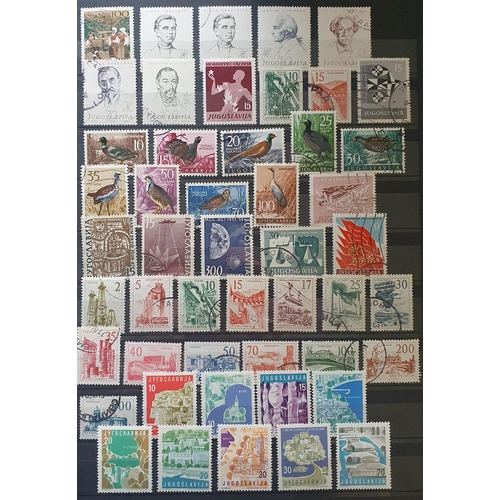 422 - A large collection of Yugoslavia and Albania Stamps.