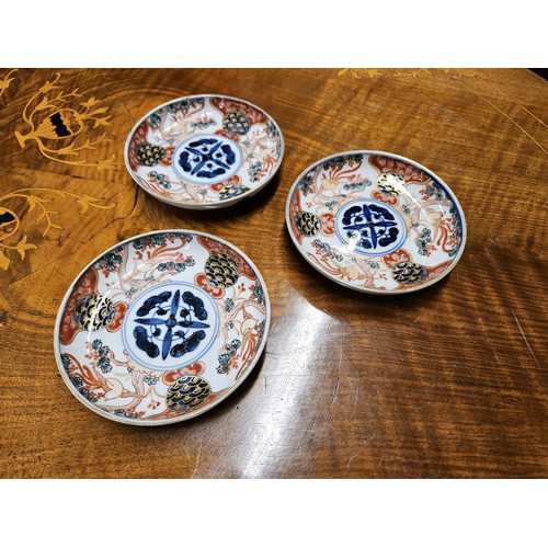 1005 - A good group of early hand painted Oriental pin Dishes.