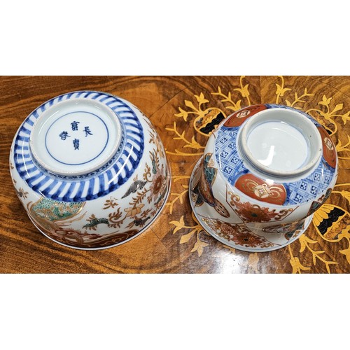 1112 - Two hand painted Oriental Bowls.