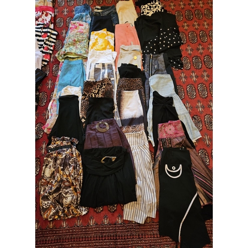 876 - A large quantity of ladies Skirts 30+. Size 8/12 approx. Please note no condition reports will be do... 