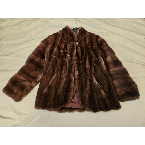 895 - A good short Mink Coat. Please note no condition reports will be done on this lot. We recommend you ... 