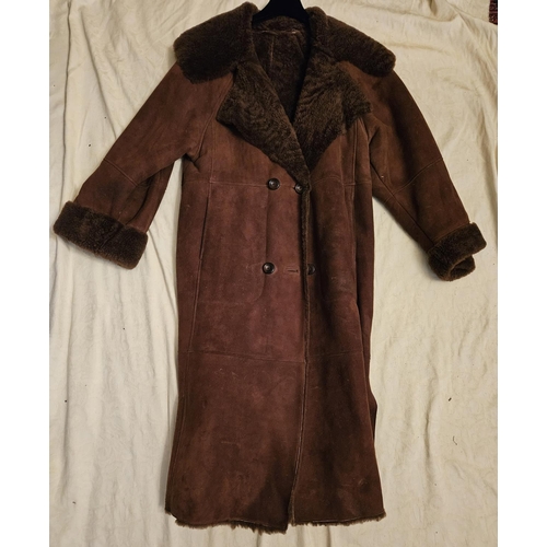 907 - A full length ladies sheepskin Coat by Friitala. Please note no condition reports will be done on th... 