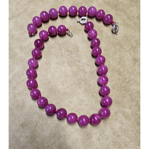 953 - A Pink Stone Necklet and Bracelet.