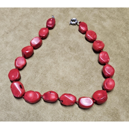 957 - An Coral Stone Necklace.