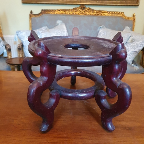 100 - An early Oriental hand painted Pot of large size on a hardwood stand. Diam. 36 x H 52 cm approx.