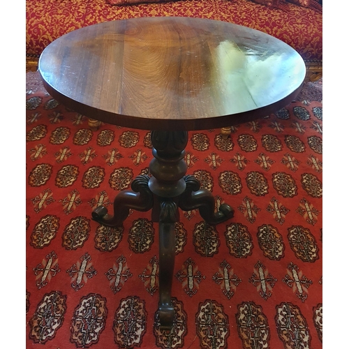 102 - A good 19th Century Rosewood circular Wine Table on turned shaft and highly carved tripod supports D... 