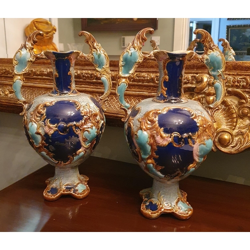 118 - A pair of 19th Century Majolica style Vases. H 38 cm approx.