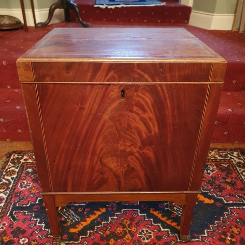 127 - A Regency Mahogany and Inlaid Side Cabinet with lift up lid on square supports and brass castors. 
4... 