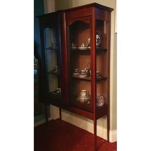 130 - An Edwardian Mahogany and Inlaid two door Display Cabinet on square tapered supports.
W 113 x D 34 x... 