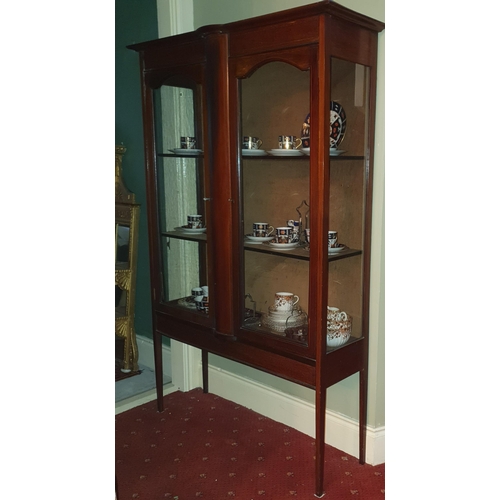 130 - An Edwardian Mahogany and Inlaid two door Display Cabinet on square tapered supports.
W 113 x D 34 x... 