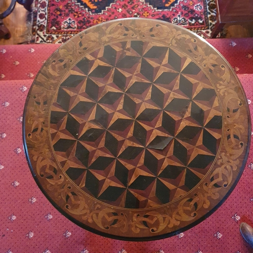 137 - A good 19th Century Walnut Specimen Table with highly inlaid circular top barley twist shaft and car... 