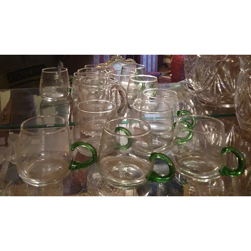 14 - A quantity of green glass Glasses and others.