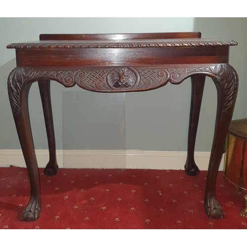 142 - A late 19th early 20th Century Mahogany Irish Mask Table with carved rope edge top and lions head ma... 